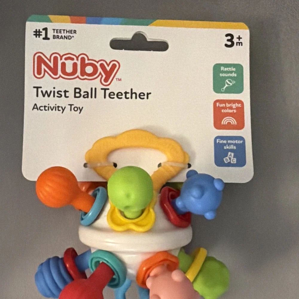 Nuby Textured Twist Ball Baby Teether Toy with Colorful Rattle